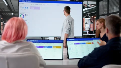 Sales Manager Is Giving A Presentation About CRM Software Stock Footage 332902256