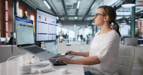 Sales Manager Guiding Team Using CRM Software To Track Customer Leads. Stock Photos