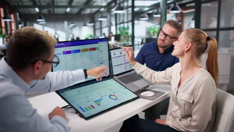 Sales Manager Leads Diverse Team Using CRM Software For Customer Growth Stock Footage 336790256