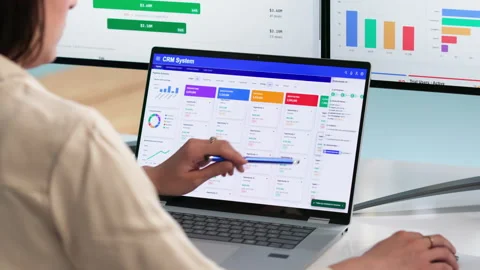 Sales Manager Reviewing Client Data On Laptop Stock Footage 337641079
