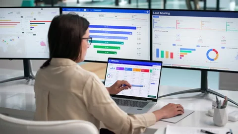 Sales Manager Reviewing Client Data On Laptop Stock Footage 338171100