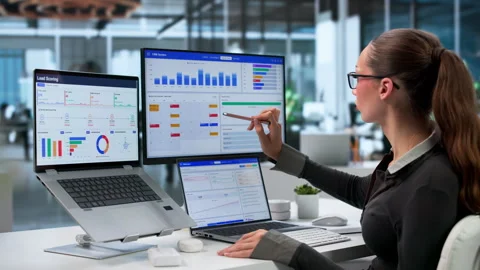 Sales Manager Reviews Customer Data On Laptop Stock Footage 343888466