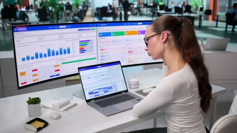 Sales Manager Reviews Customer Data On Laptop Stock Footage 343888978
