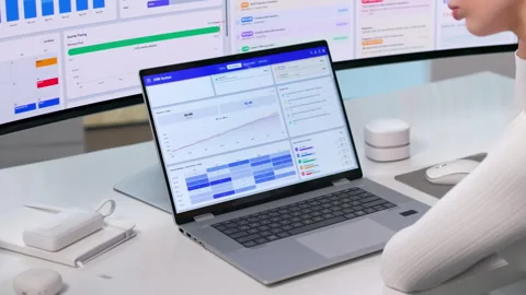 Sales Manager Reviews Customer Data On Laptop Stock Footage 344715018