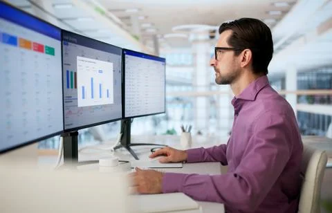Sales Manager Studies Lead Scoring Dashboard On PC To Boost Pipeline. Stock Photos