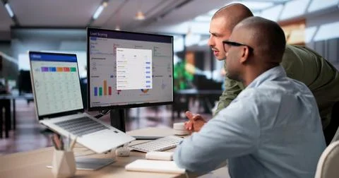 Sales Manager Studies Lead Scoring Dashboard To Improve Marketing Workflow Ef Stock Photos