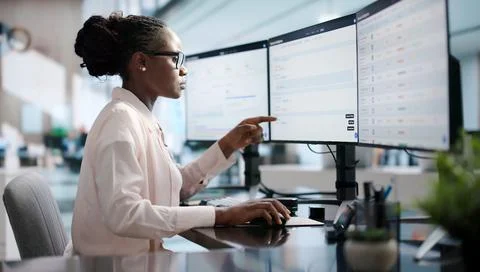 Sales Manager Studies Pipeline Data On Computer To Improve Sales Strategy. Stock Photos