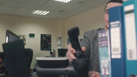 Sales. Manager talking to a customer on the phone Stock Footage 82089094