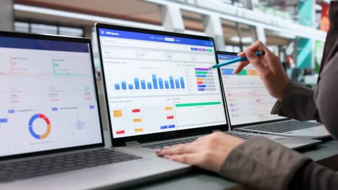 Sales Manager Tracking Customer Leads Using CRM Software Stock Footage 344713508