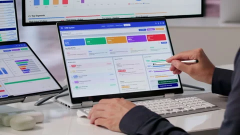 Sales Manager Using Dual Touchscreen Laptop Stock Footage 340398396