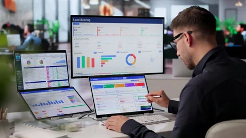 Sales Manager Using Dual Touchscreen Laptop Stock Footage 342960463