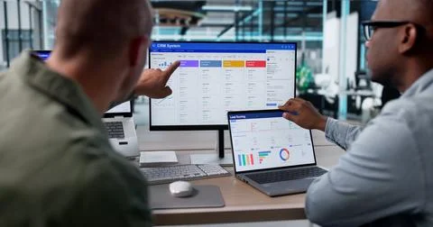 Sales Managers Discuss CRM Software Features To Boost Business Growth Togethe Stock Photos