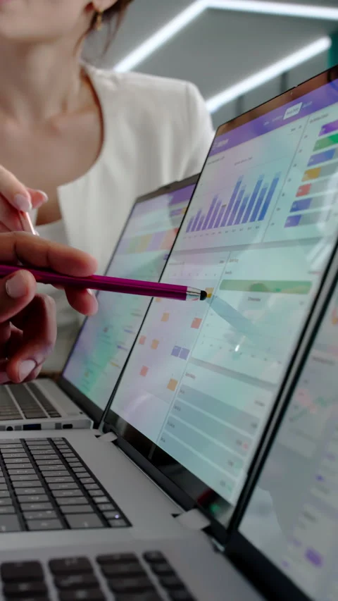 Sales Managers Discussing Customer Data On Laptop Stock Footage 343882908