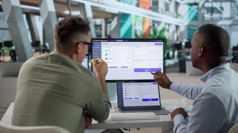 Sales Managers Review Commission Dashboards Together Stock Footage 345850741