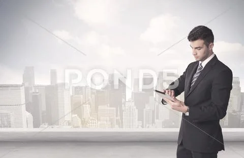 Sales person talking in front of city scape Stock Photos