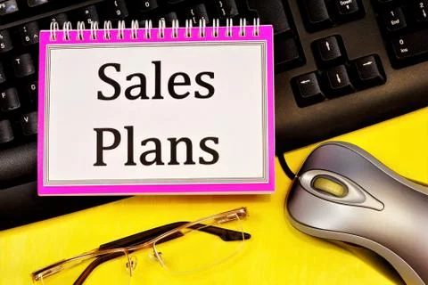 Sales plan-writing on a Notepad. Long-term vision of future actions Stock Photos