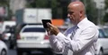 Salesman Touch Tablet Web Search Read Send Email City Center Street Jam View 4k or 4k+ Resolution