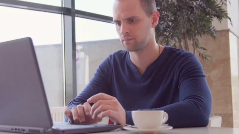 Salesman working in office with laptop computer Stock Footage 73363816