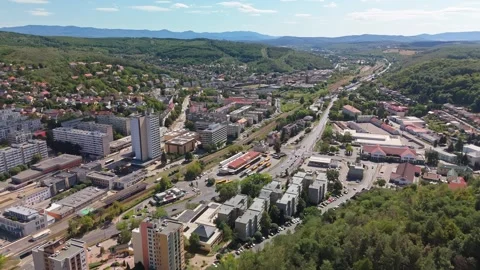 Salgótarján cityscape with panel buildings and green hills in summer view Vídeos de archivo 346152509