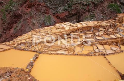 Salinas de Maras - salt evaporation ponds near town of Maras in Peru Stock Photos