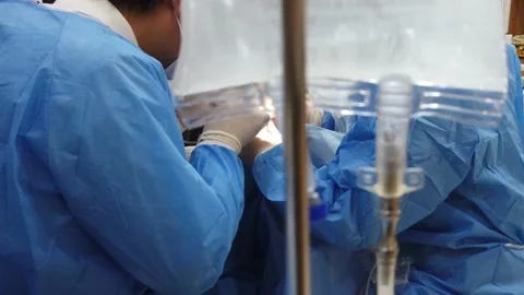 Saline bag during dental implants surgery Stock Footage 167355467