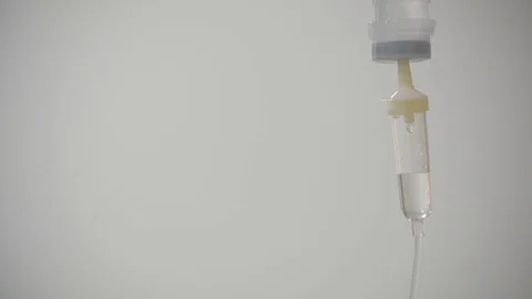 The saline drops from the bottle flowing through the hose. Stock Footage 130121804