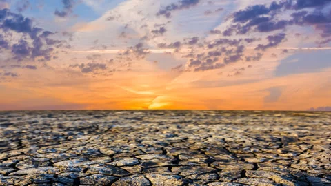 Saline dry land in a crack at the sunset Vidéo 334837697