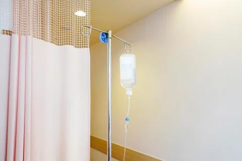 Saline solution drip for patient Stock Photos