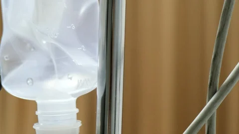 Saline solution in Intravenous Drip Dropper. Stock Footage 102560555