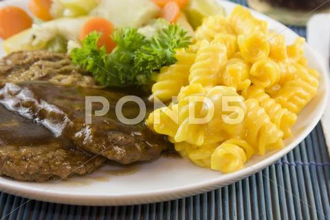 Salisbury steak with macaroni Stock Photos