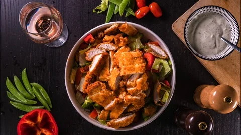 Sallad with deep fried chicken on top Stock-Footage 106500443