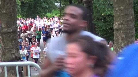 Salmini 10019-081015 - Runners by camera in background and foreground Video stock 53230373