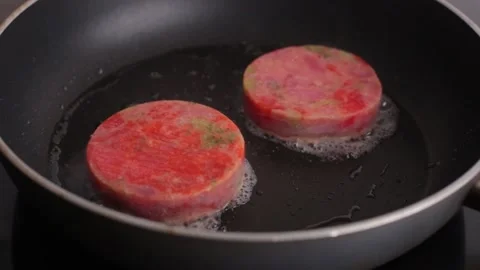 Salmon and broccoli steak fried in a pan. fish steak close up. cooking dinner at Stock Footage 169259264