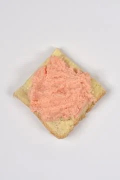 Salmon and fish roe spread on a slice of bread Stock Photos