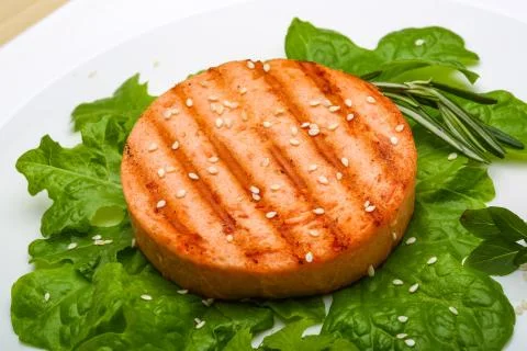 Salmon burger cutlet Stock Photos