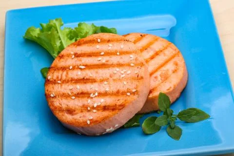Salmon burger cutlet Stock Photos