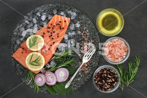 Salmon on Crushed Ice with Seasoning Stock Photos