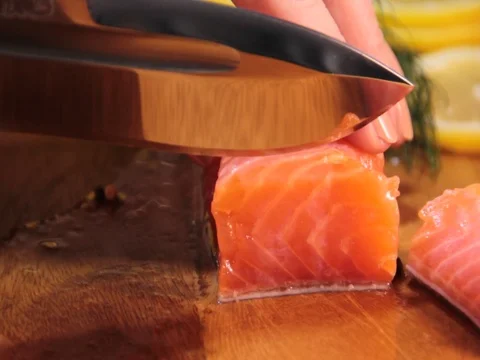 Salmon cut with a knife Stock Footage 77002980