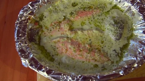 Salmon Dish Bubbling In Bubbling Sauce Stock Footage 73610433
