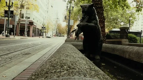A salmon-eating bear statue in an empty street in downtown Portland, Oregon Stock Footage 144189064