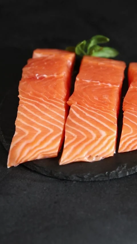 Salmon fillet raw red fish fresh seafood tasty snack  pescetarian diet gourmet Stock Footage 343998973