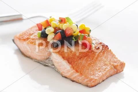 Salmon Fillet Topped with Black Bean and Corn Salsa Stock Photos