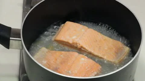 Salmon Fillets Poaching Stock Footage 12331578