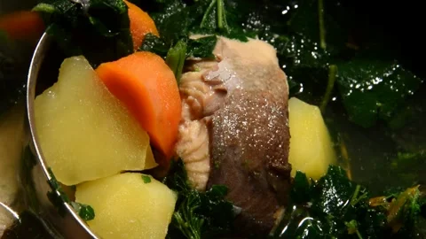 Salmon fish soup with nettle Stock Footage 321359440