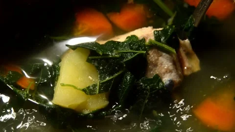 Salmon fish soup with nettle Stock Footage 321359576