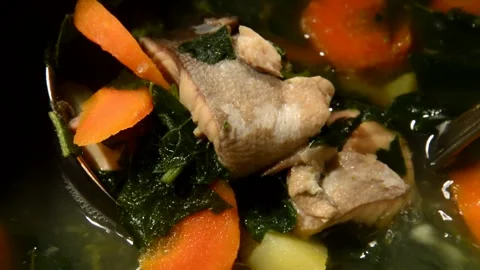 Salmon fish soup with nettle Stock Footage 321359674