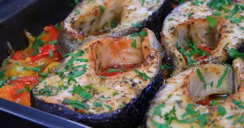 Salmon fish with vegetables ready to be served Stock Footage 163434880