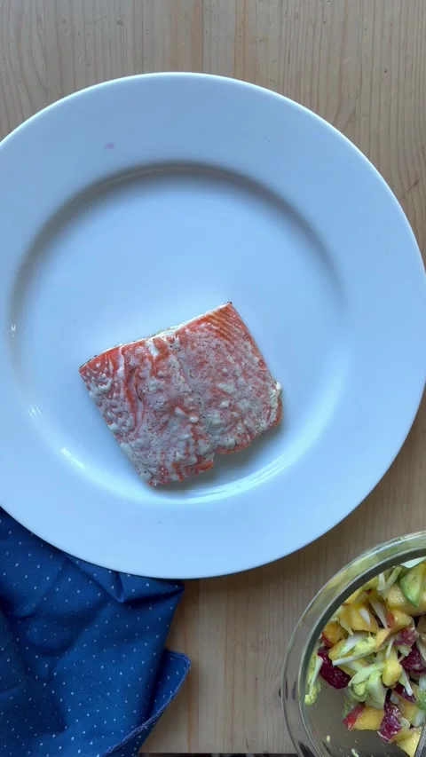 Salmon with fruit salsa vertical Stock Footage 247663686