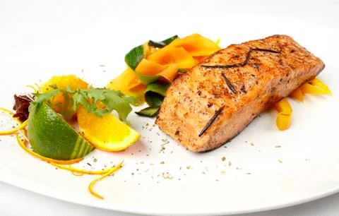 Salmon on grate with lime Foto stock