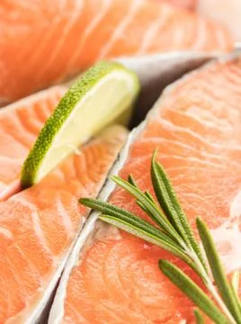Salmon with lemon slice close-up Stock Photos